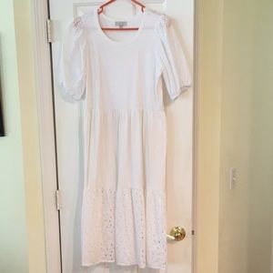 Adorable White Dress with Eyelet Sleeves and Hem